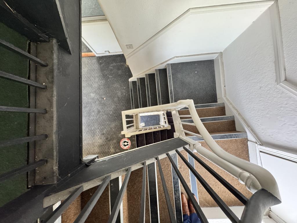 Lot: 78 - SHOP WITH OFFICE ACCOMMODATION ON UPPER FLOORS - looking down from the second floor